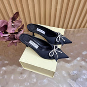 JIMMY CHOO 26S HIGH-HEELED MULES 65 MM IN BLACK SATIN WITH RHINESTONE BOW