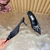JIMMY CHOO 26S HIGH-HEELED MULES 65 MM IN BLACK SATIN WITH RHINESTONE BOW