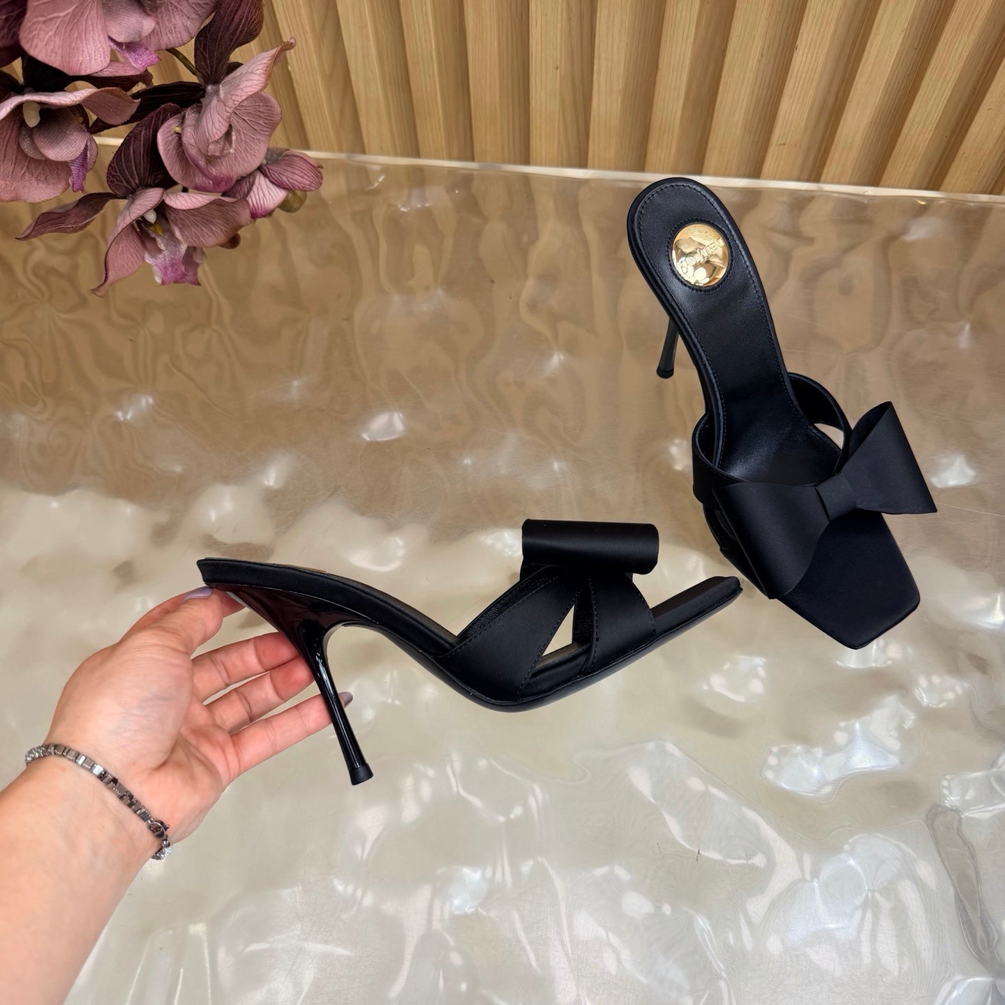YSL 26S HIGH HEEL SANDALS 90 MM IN BLACK SILK WITH OVERSIZED BOW EMBELLISHMENT