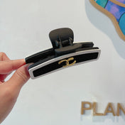 CHANEL 26S BARRETTE HAIR CLIP IN BLACK AND IVORY LEATHER 505338