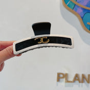 CHANEL 26S BARRETTE HAIR CLIP IN BLACK AND IVORY LEATHER 505338