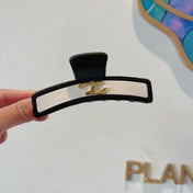CHANEL 26S BARRETTE HAIR CLIP IN BLACK AND IVORY LEATHER 505339