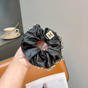CHANEL 26S SCRUNCHIE IN BLACK SILK 512071