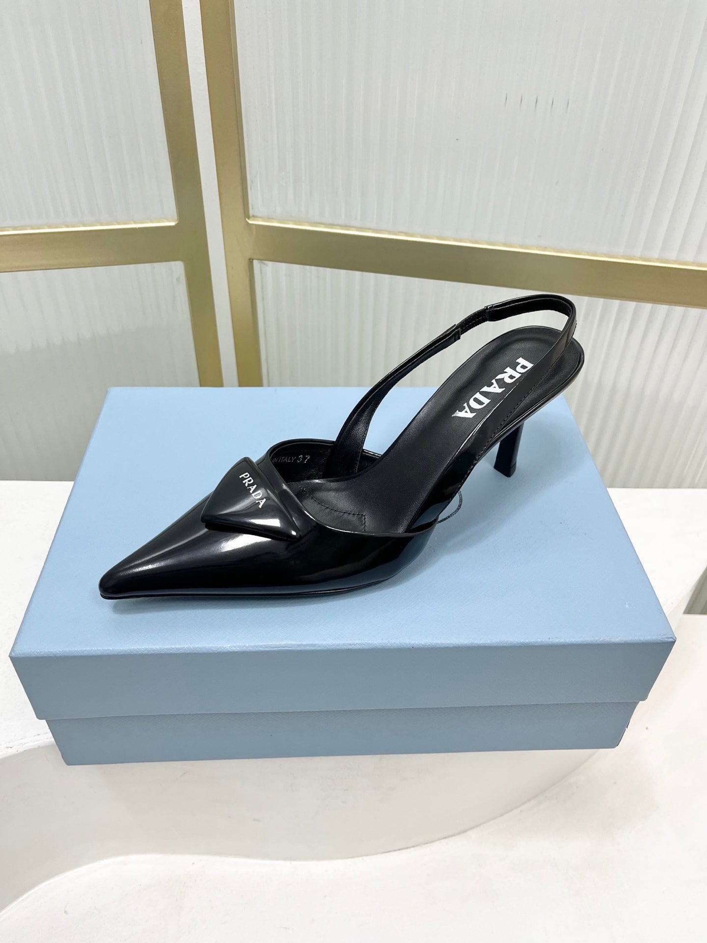 PRADA 26S SLINGBACK HIGH HEEL SANDALS 75MM IN BLACK CALFSKIN WITH LOGO