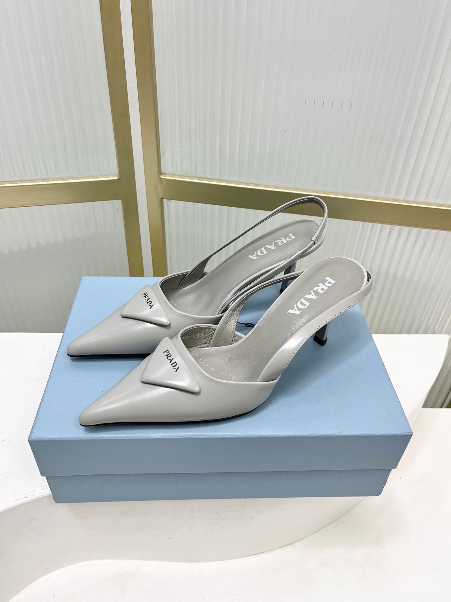 PRADA 26S SLINGBACK HIGH HEEL SANDALS 75MM IN LIGHT GRAY CALFSKIN WITH LOGO