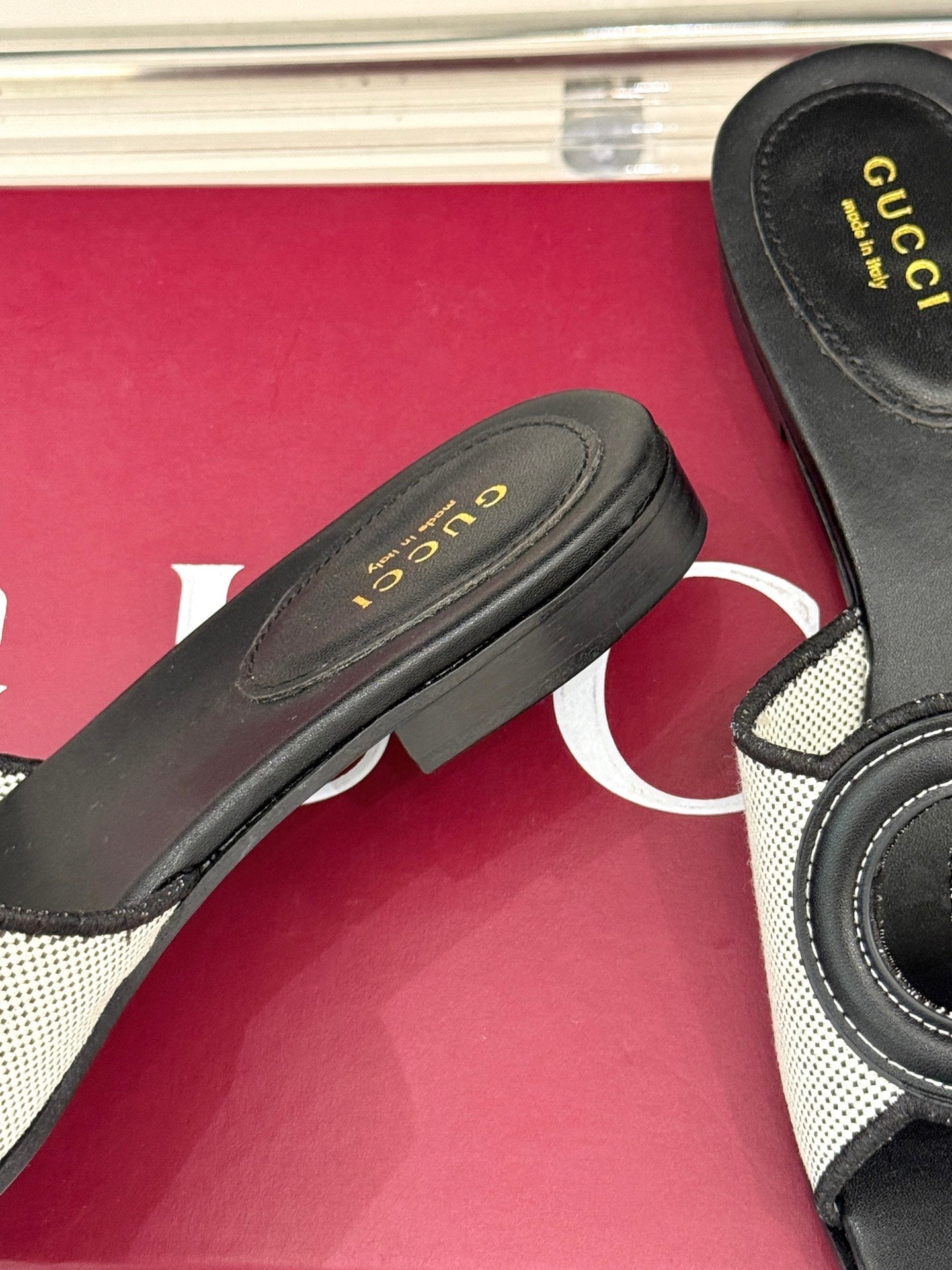 SLIDE SANDALS IN BLACK AND WHITE CALFSKIN
