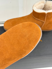 ALAIA 26S SNOW BOOTS IN DARK ORANGE SUEDE AND WOOL