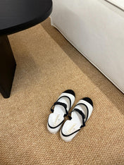 CHANEL 26S MARY JANE SLINGBACK FLATS IN WHITE AND BLACK CALFSKIN CAP TOE RIBBON STRAP