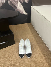 CHANEL 26S MARY JANE HEELS IN WHITE CALFSKIN WITH BLACK CAP TOE