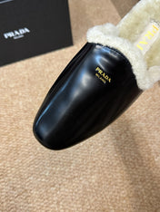 PRADA 26S SHEARLING MULE SLIPPERS IN BLACK CALFSKIN