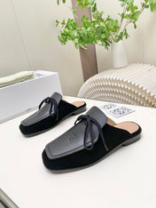 LOEWE 26S FLAT MULES IN BLACK CALFSKIN AND SUEDE