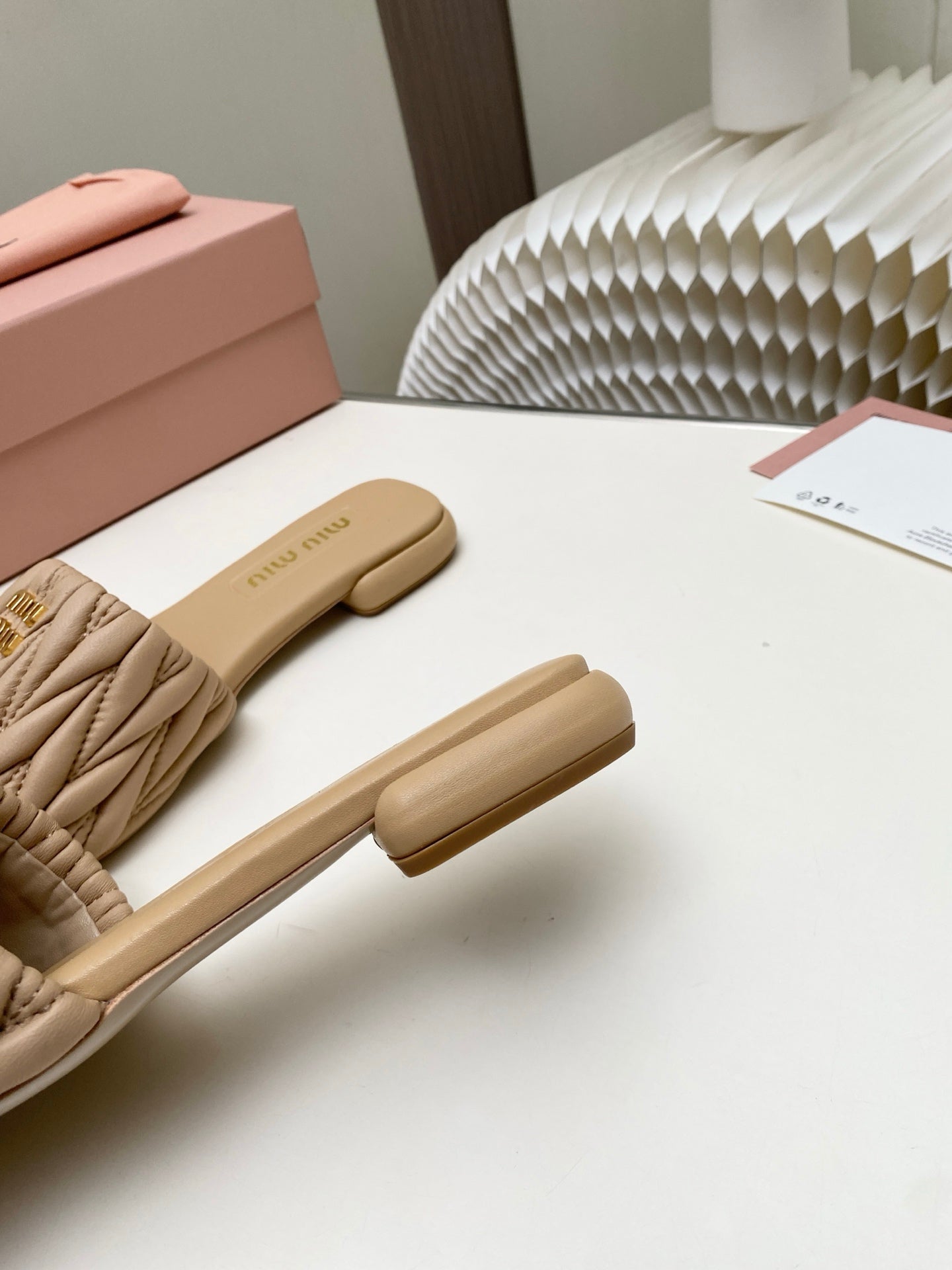 MIUMIU 26S MATELASSE SLIDES IN BEIGE CALFSKIN