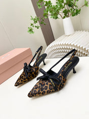 MIUMIU 26S SLINGBACK PUMPS 55MM IN LEOPARD PRINT CALF HAIR WITH BOW