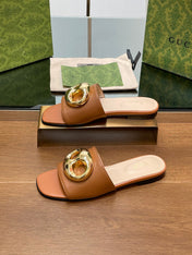 FLAT MULE IN BRONE BROWN CALFSKIN WITH GOLD HARDWARE