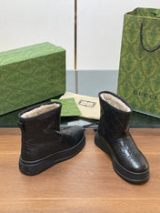 GG UGG BOOTS IN BLACK EMBOSSED SUEDE AND BEIGE WOOL LINING