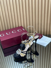 GUCCI 26S HIGH-HEELED SANDALS 125 MM IN BLACK SATIN AND GOLD CALFSKIN