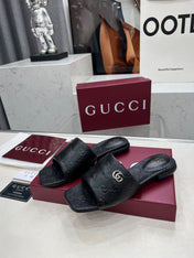 GG CASUAL SLIPPERS IN BLACK CALFSKIN LOGO EMBOSSING