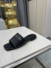GG CASUAL SLIPPERS IN BLACK CALFSKIN LOGO EMBOSSING