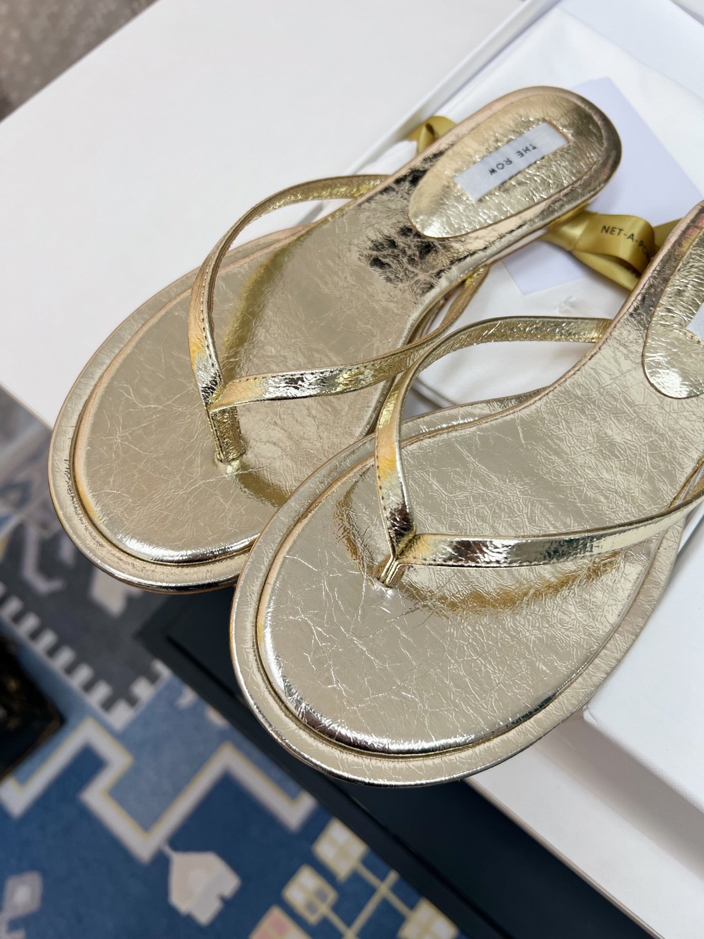 THE ROW 26S THONG SANDALS IN GOLD CALFSKIN
