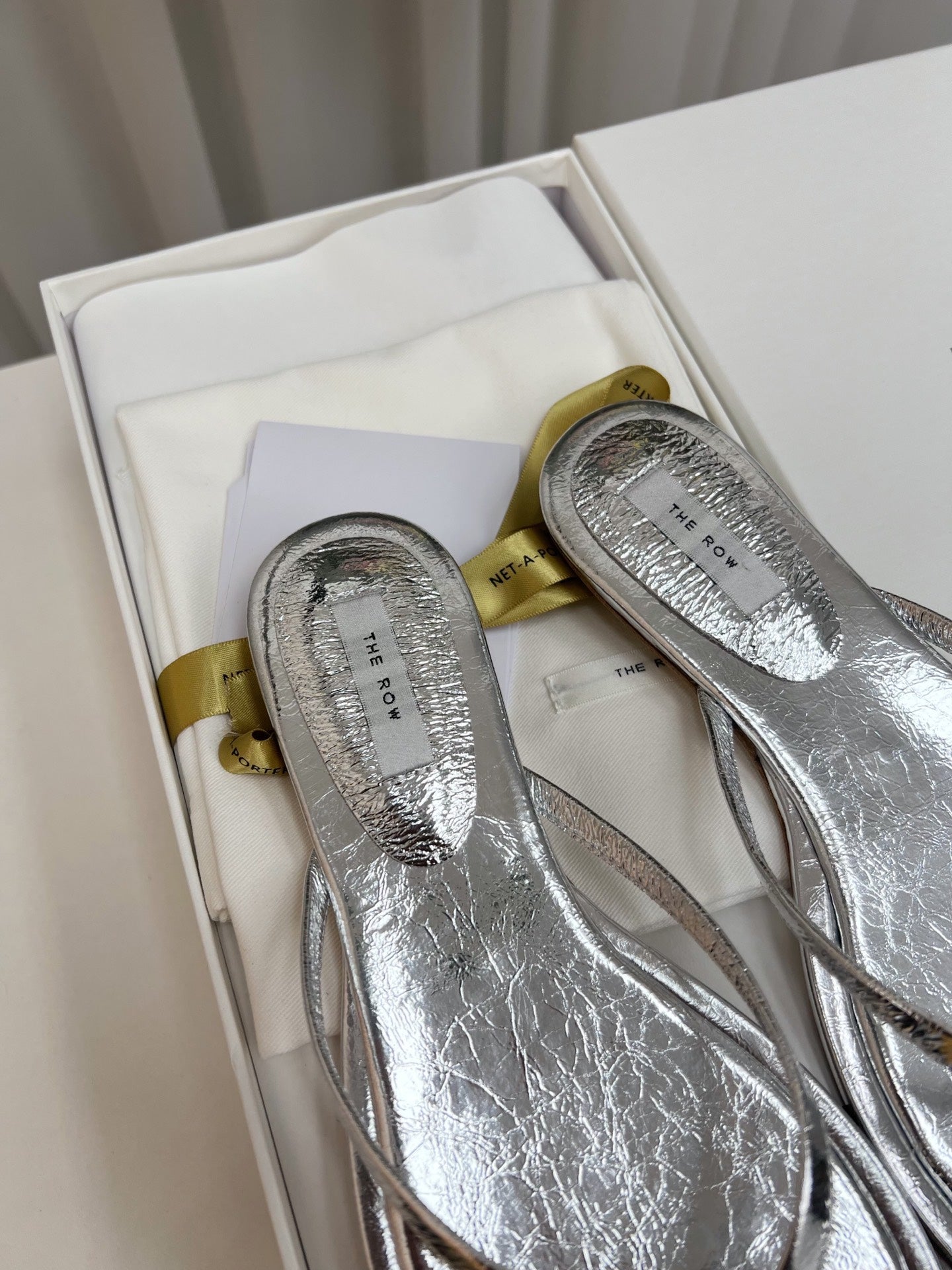 THE ROW 26S THONG SANDALS IN SILVER CALFSKIN