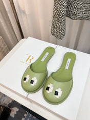 THE ROW 26S PIXEL APPLIQUE MULES IN PISTACHIO GREEN CALFSKIN