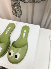 THE ROW 26S PIXEL APPLIQUE MULES IN PISTACHIO GREEN CALFSKIN