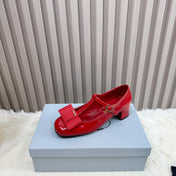 PRADA 26S T-STRAP MARY JANE PUMPS 40MM IN RED PATENT CALFSKIN WITH BOW