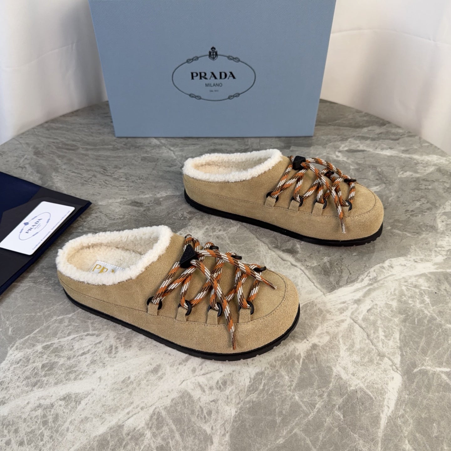 PRADA 26S WOVEN MULES IN DARK BEIGE SUEDE