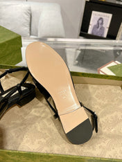 METALIC SLINGBACK FLATS IN BLACK CALFSKIN