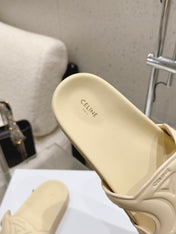 CELINE 26S TRIOMPHE SLIDES IN PASTEL YELLOW CALFSKIN