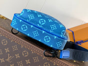 AVENUE SLINGBAG 31 IN BLUE AND BROWN TAIGA LEATHER