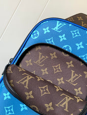 AVENUE SLINGBAG 31 IN BLUE AND BROWN TAIGA LEATHER