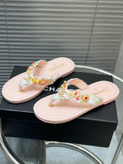 THONG SLIPPERS IN LIGHT PINK SOFT LEATHER WITH LOGO STICKER DETAIL