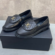 CHANEL 26S LOAFERS IN BLACK QUILTED CALFSKIN WITH CHAIN CC LOGO