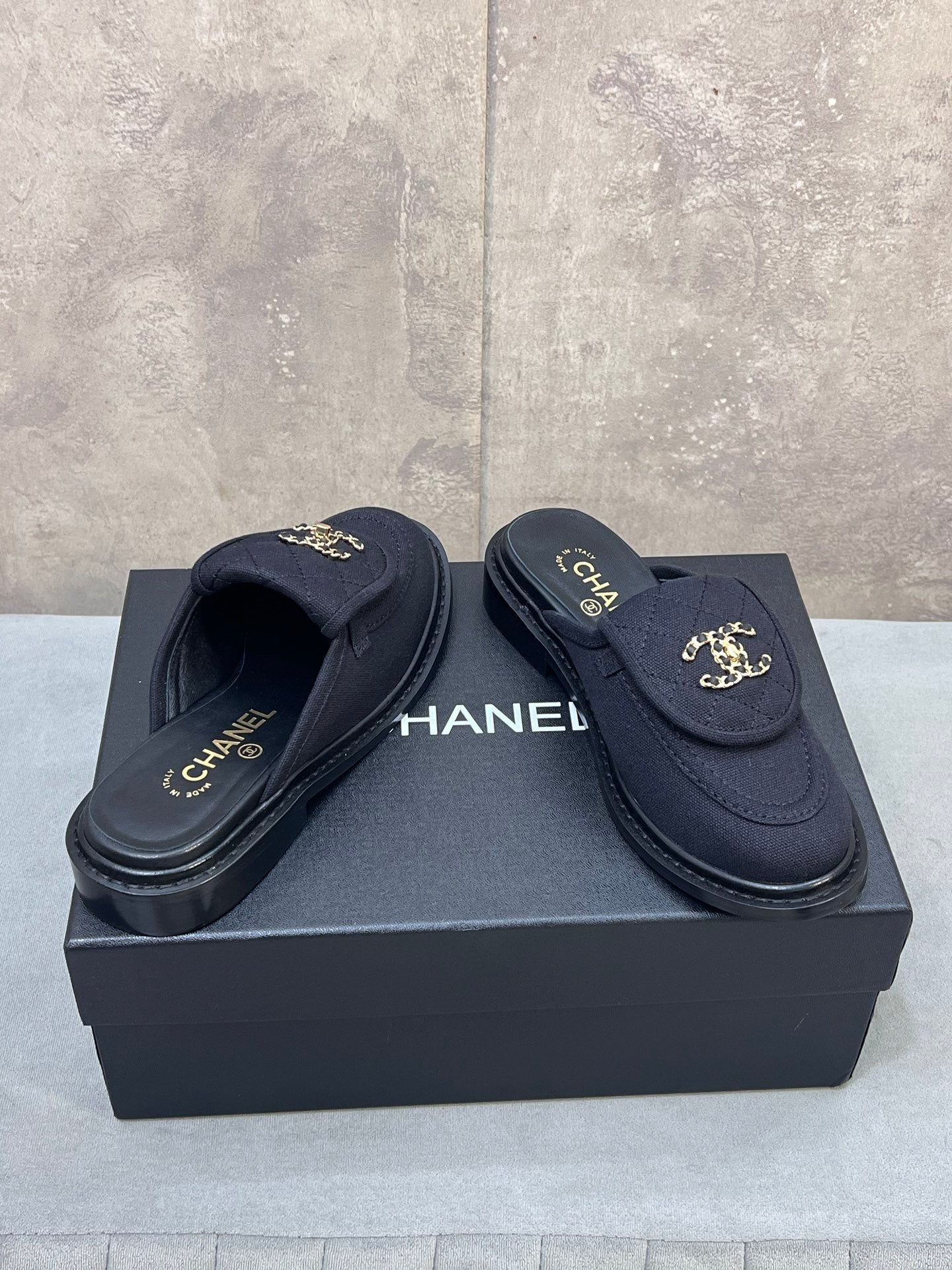 CHANEL 26S MULE LOAFERS IN BLACK CANVAS WITH QUILTED FLAP & CHAIN CC LOGO