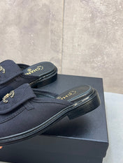 CHANEL 26S MULE LOAFERS IN BLACK CANVAS WITH QUILTED FLAP & CHAIN CC LOGO