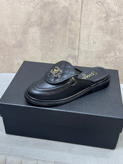 CHANEL 26S MULE LOAFERS IN BLACK QUILTED CALFSKIN WITH CC LOGO