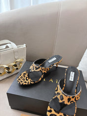 ALAIA HEELED THONG 25S 55 MM IN LEOPARD PONY HAIR LEATHER