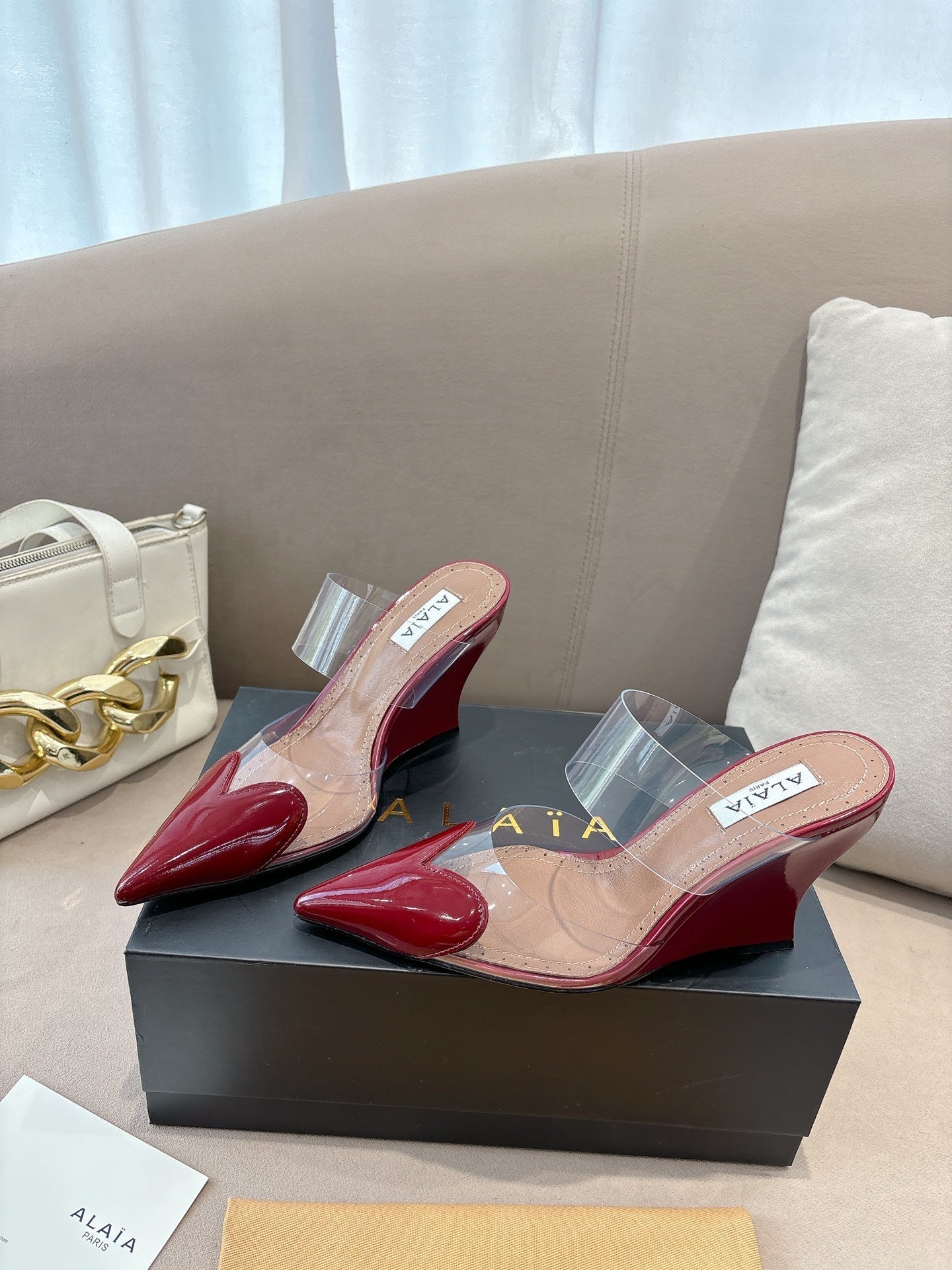 ALAIA 26S HIGH-HEEL WEDGE MULES 95 MM IN DARK RED GLOSSY CALFSKIN