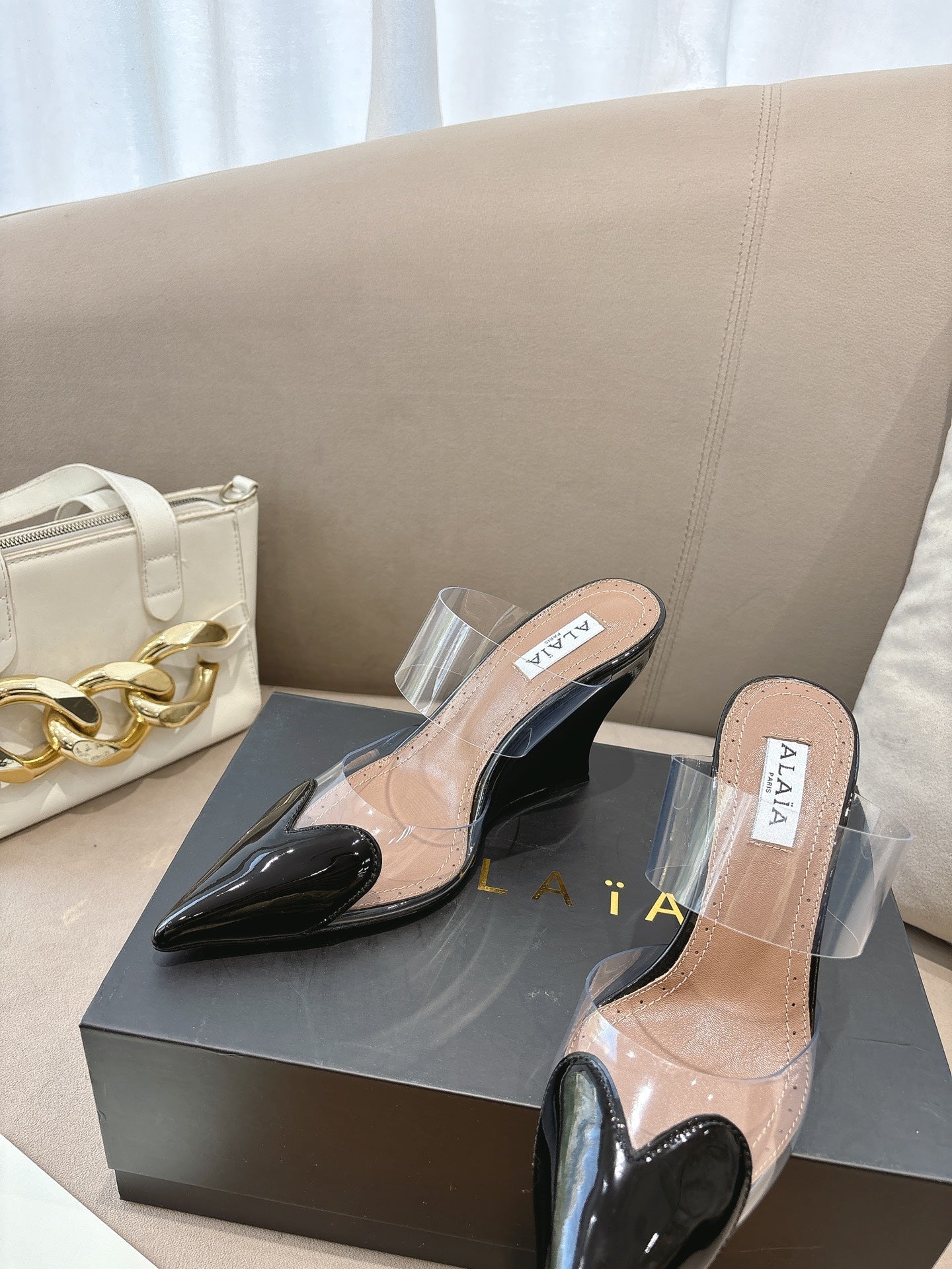 ALAIA 26S HIGH-HEEL WEDGE MULES 95 MM IN BLACK GLOSSY CALFSKIN