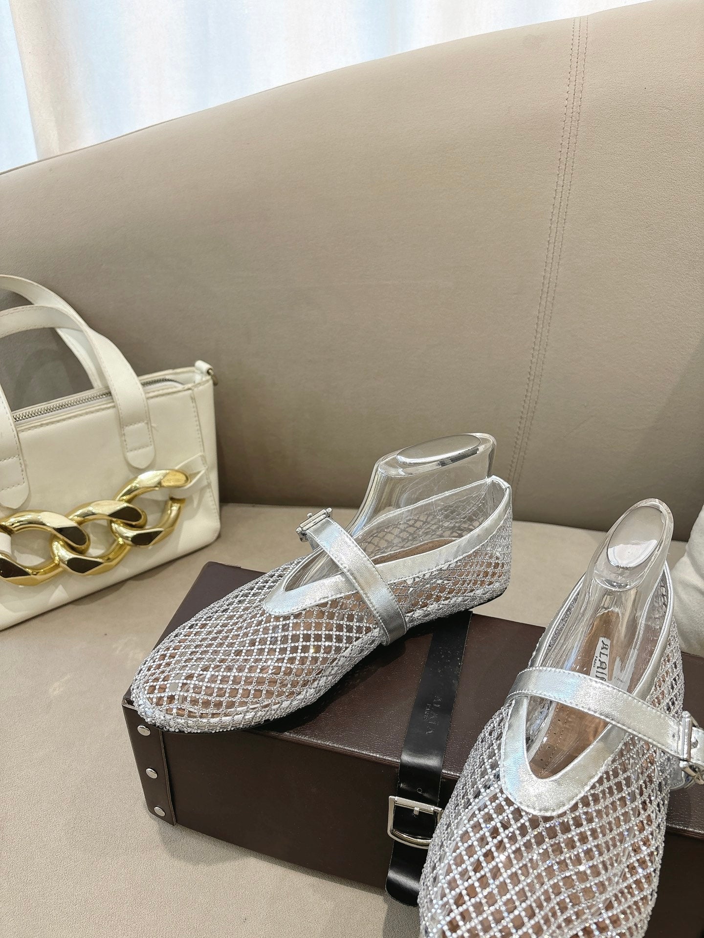 ALAIA 26S MESH FLATS IN SILVER LAMBSKIN