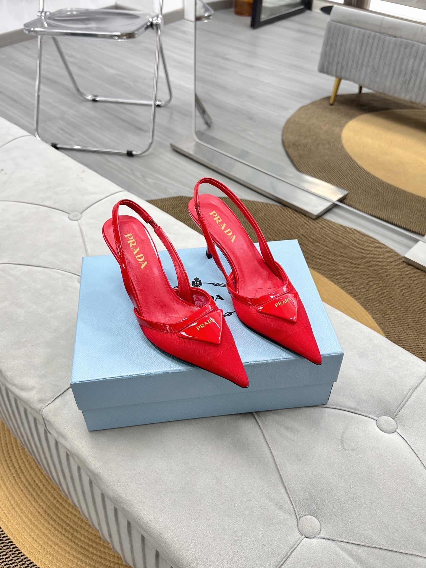 PRADA 25S TRIANGLE LOGO SLINGBACK PUMPS IN RED MESH FABRIC