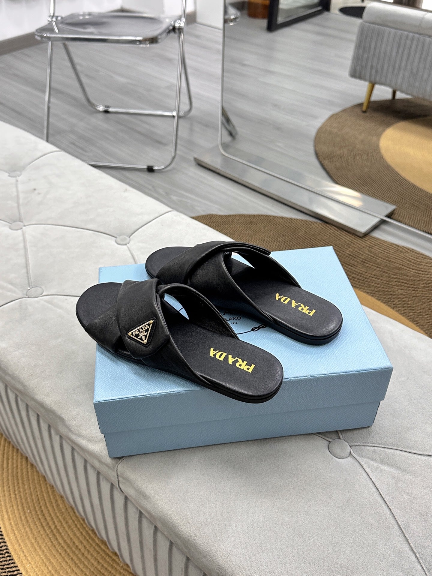 PRADA 25S SLIDE SANDALS IN BLACK CALFSKIN LOGO