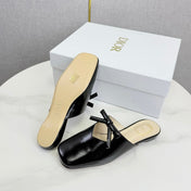 DIOR 26S PEARL-ACCENT BOW FLAT MULES IN BLACK GLOSSY CALFSKIN