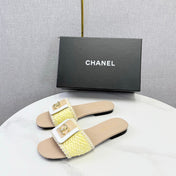CHANEL 26S WOVEN STRAP SLIDES IN YELLOW AND BEIGE LAMBSKIN