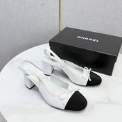 CHANEL 26S SLINGBACK HEELS 45 MM IN WHITE LAMBSKIN AND BLACK FABRIC