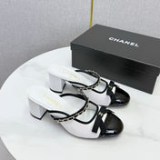 CHANEL 26S HIGH HEEL MULES 45 MM IN WHITE AND BLACK LAMBSKIN