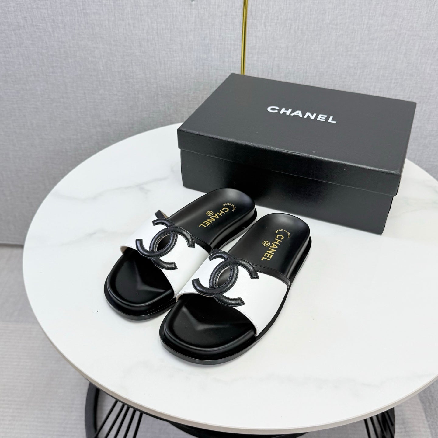 CHANEL 26S ICONIC CC SLIDES IN WHITE LAMBSKIN