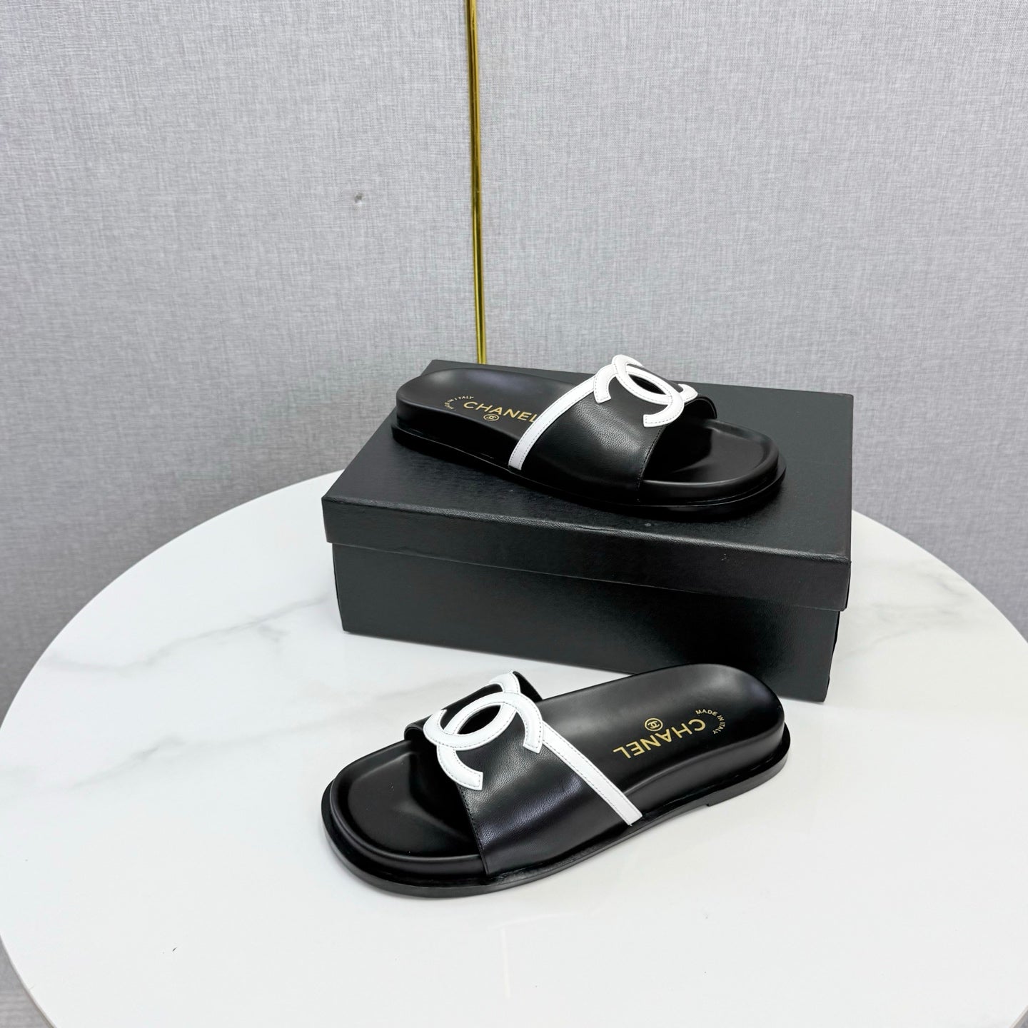 CHANEL 26S ICONIC CC SLIDES IN BLACK LAMBSKIN