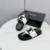 CHANEL 26S CC THONG SLIDES IN WHITE AND BLACK LAMBSKIN